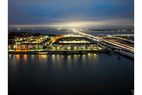 Twilight Aerial View of Reveal at Bayside Apartments  8400 Sunset Blvd Rowlett, TX 75088